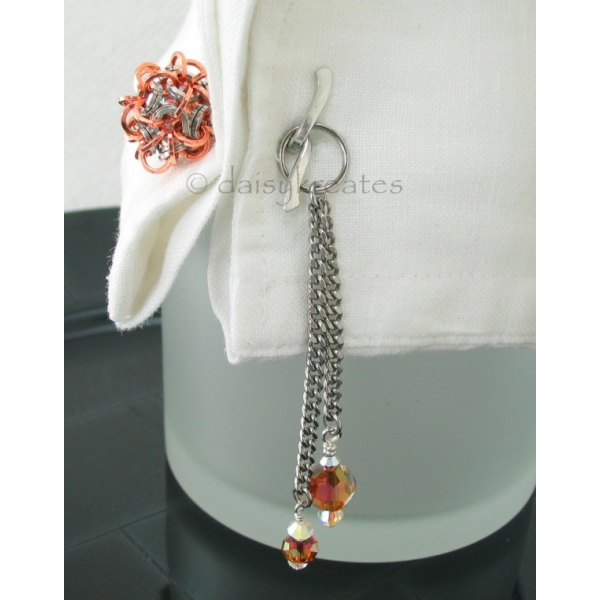 Unique design of cufflink with tassels offers feminine flair