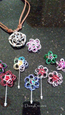 Celtic Rosettes as pins, pendant, and a finger ring